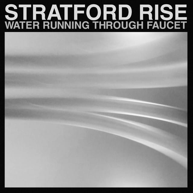 Water Running Through Faucet