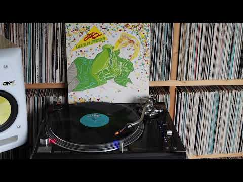 The Chaplin Band — The Chaplin Band - Dancing On Townsquare (1982) - B2 - Love Is Just A Moment Away
