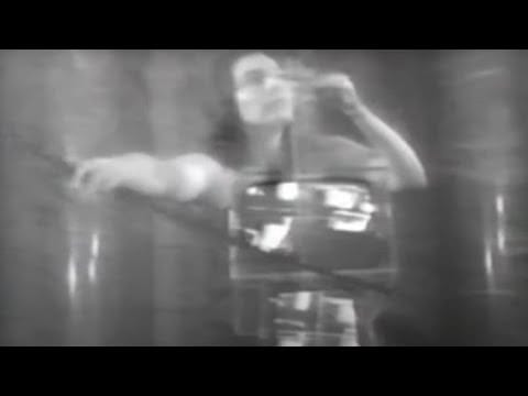 Nam June Paik — Charlotte Moorman performs with Paik's 'TV cello'