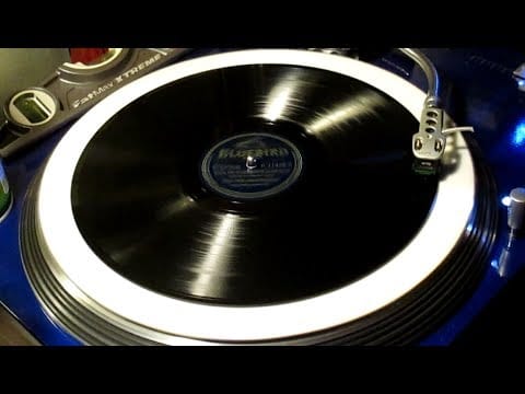 Glenn Miller And His Orchestra — Glenn Miller and Ray Eberle - "When The Roses Bloom Again" 1942