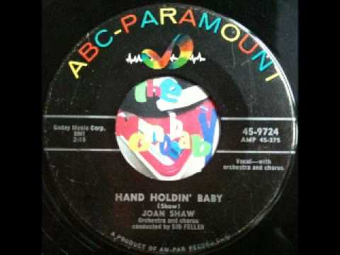 Joan Shaw — Joan Shaw (Salena Jones) - hand holding baby