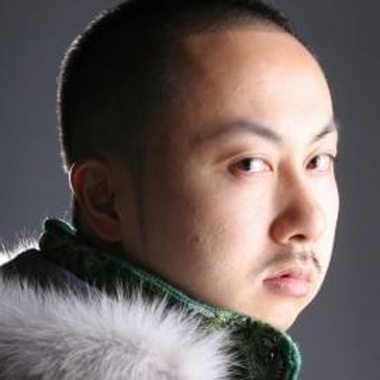 T.KURA