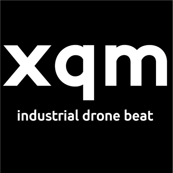 xqm