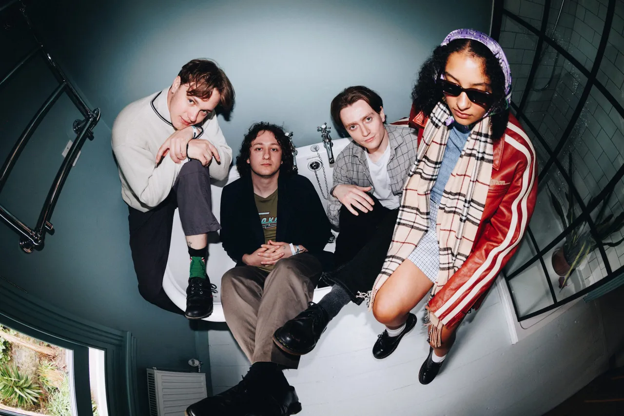 English Teacher: "I'm happy with where the band is right now, and I'm proud of what's to come"