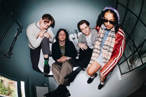 English Teacher: "I'm happy with where the band is right now, and I'm proud of what's to come"