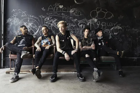 Sum 41 ride one last time with their new album 'Heaven :x: Hell': "It was only once I sat back and listened to it that I felt, you know what? I'm actually good to go out on this one"