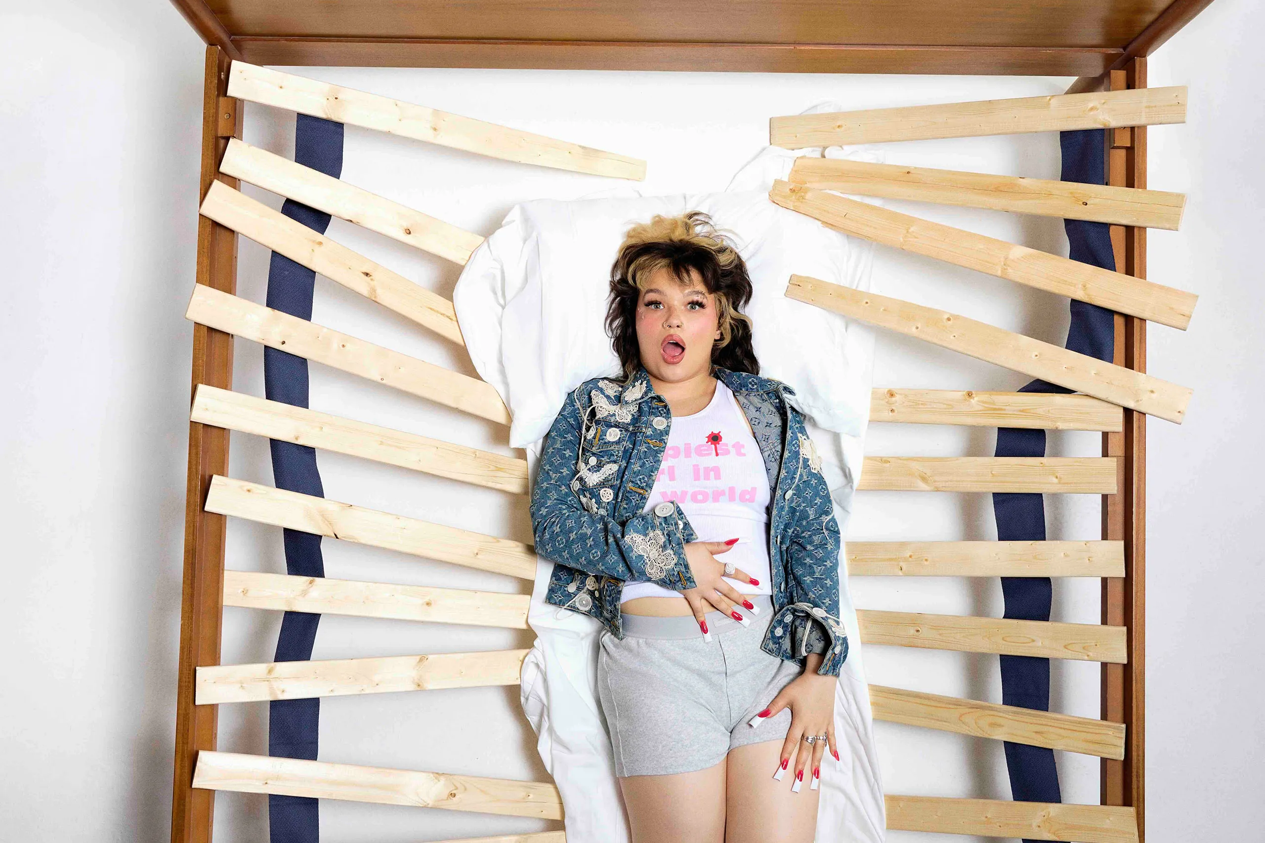 Lola Young explores themes of self-sabotage with her new single 'd£aler'