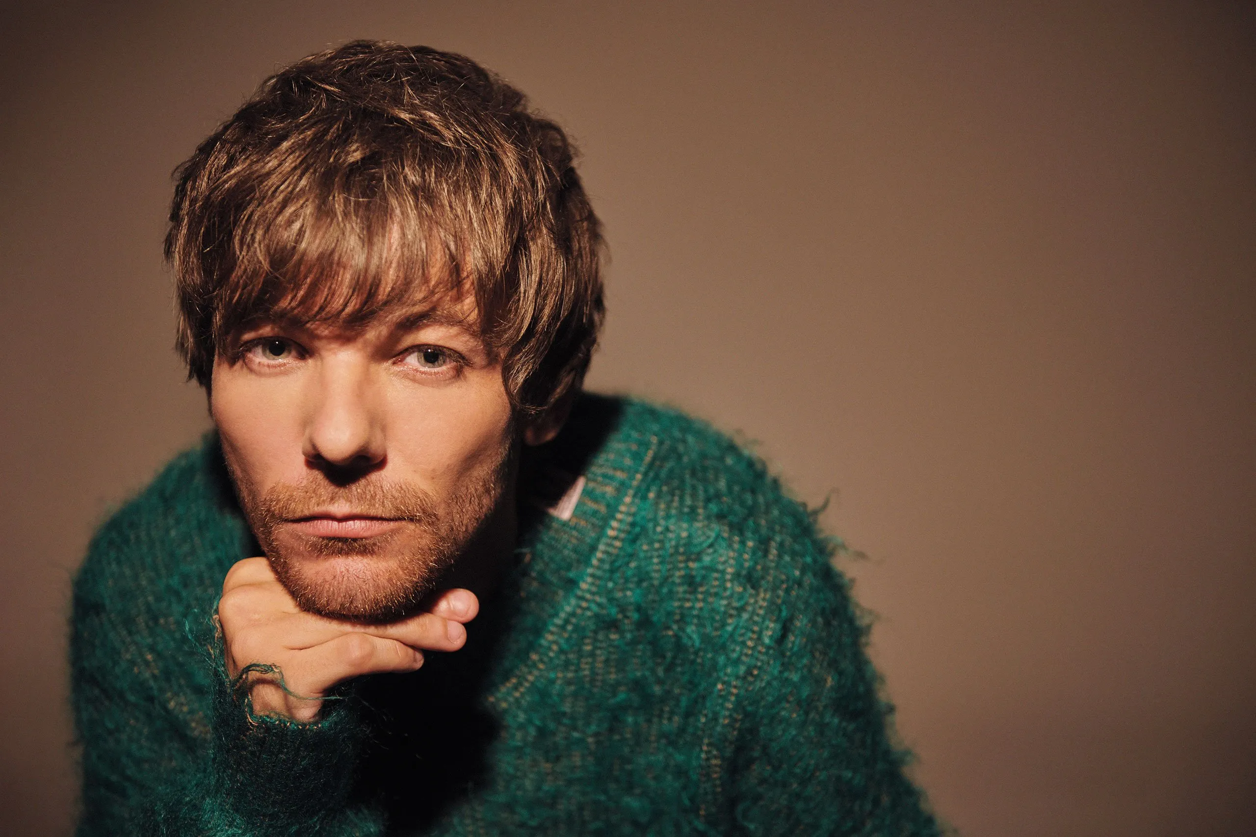 Louis Tomlinson is dropping his next single 'Out Of My System' this Friday
