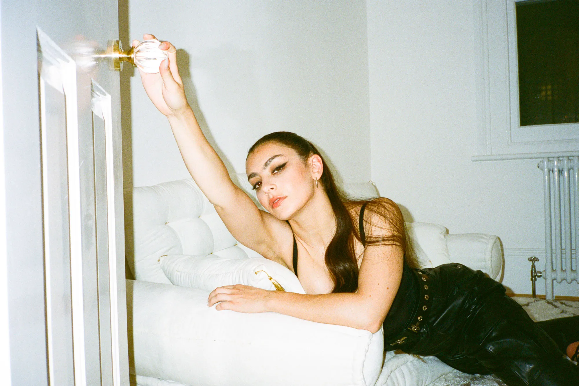 Charli XCX is "excited to be forming a supergroup with No Rome and The 1975"