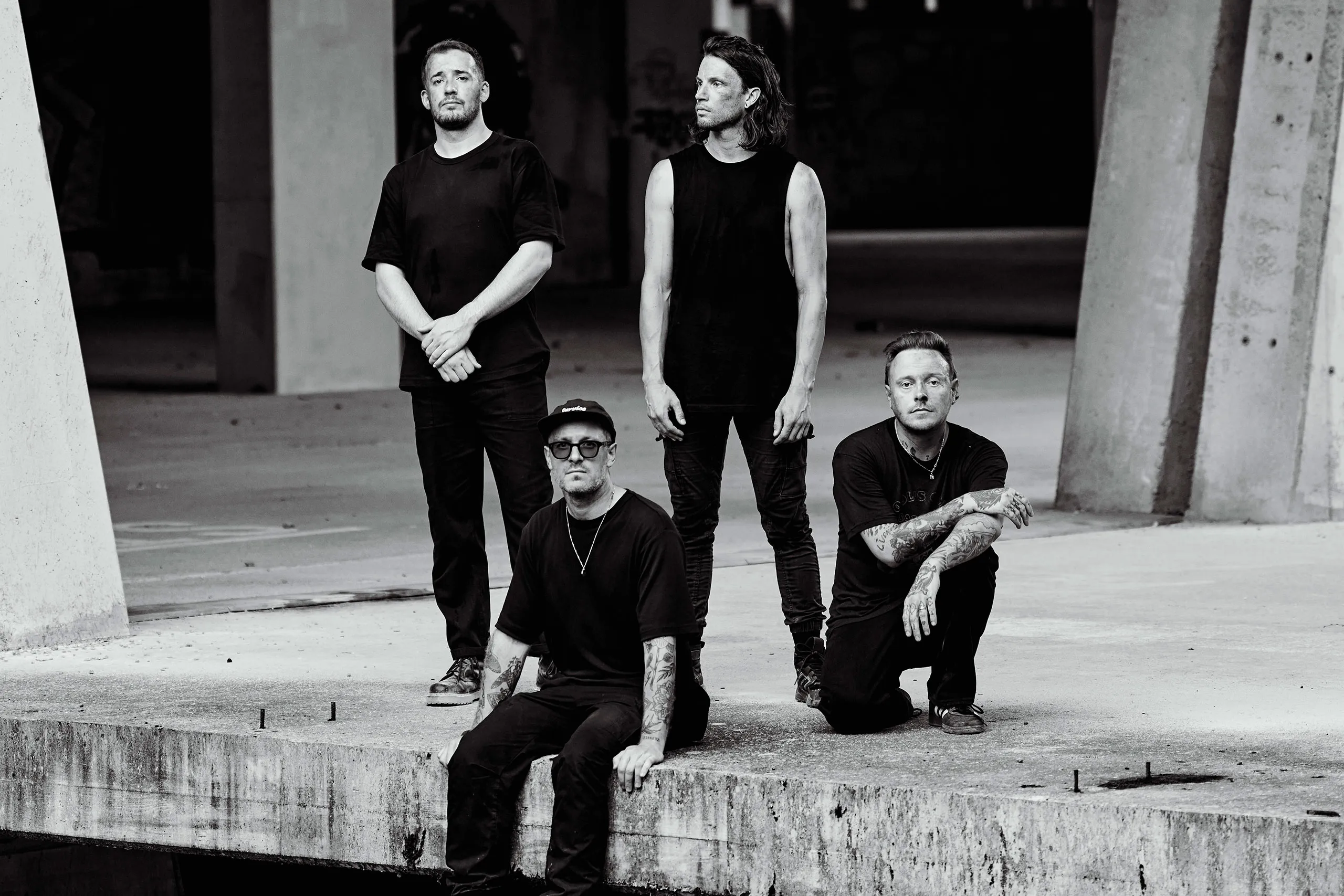 Architects battle the wind and rain for their new 'Blackhole' video