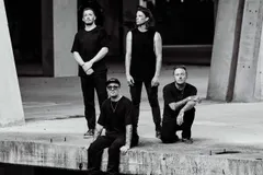 Architects battle the wind and rain for their new 'Blackhole' video