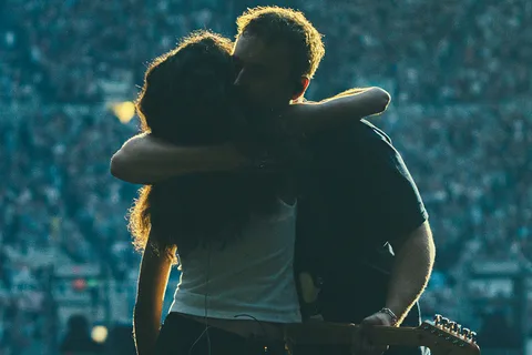 Sam Fender and Olivia Dean have reclaimed the UK number one spot with 'Rein Me In'