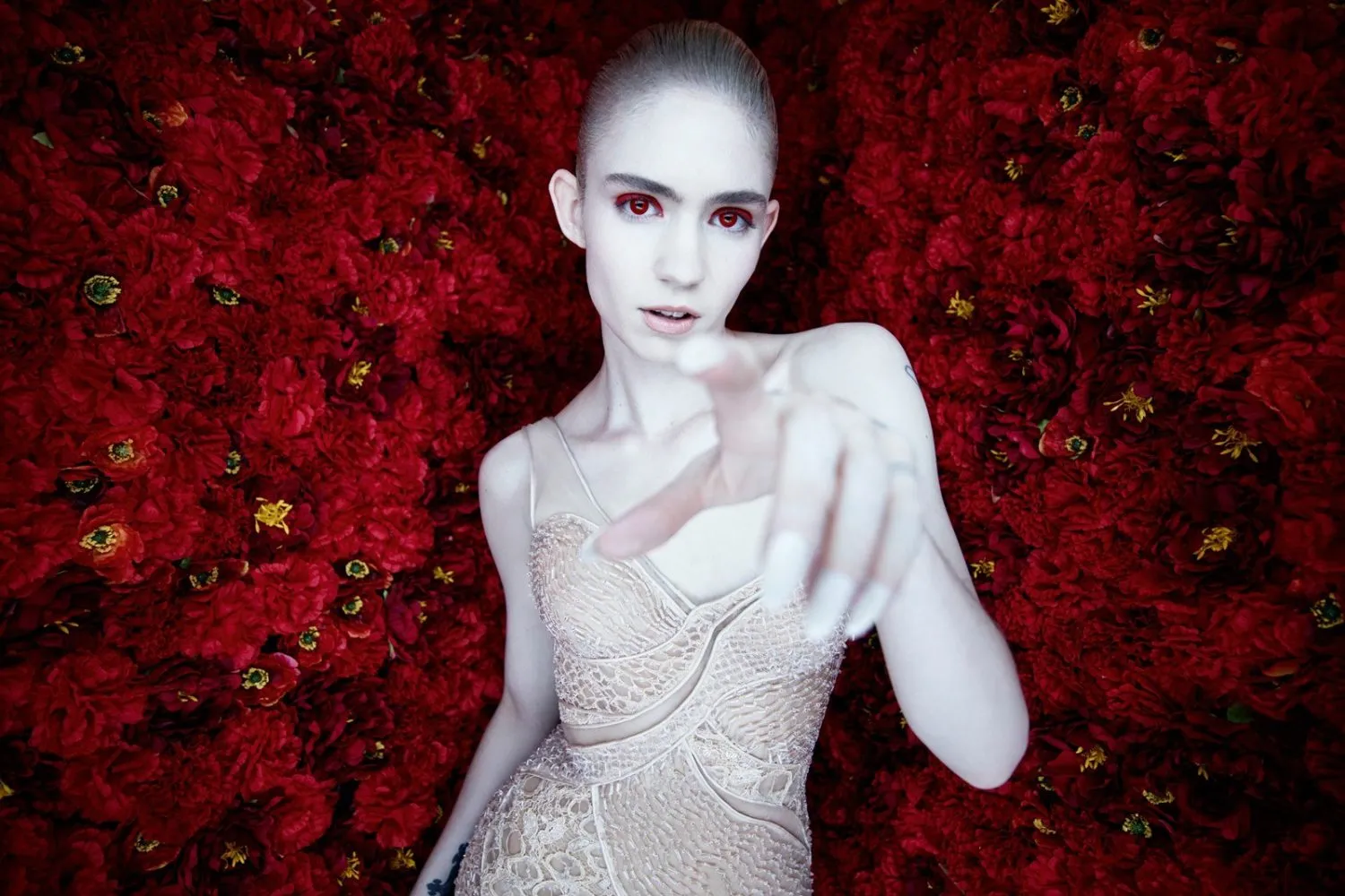 Grimes previews new “interactive music experience”
