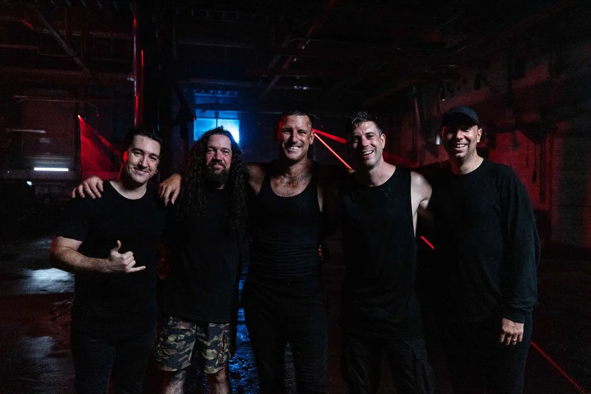 In Hearts Wake have released a new single, 'The Flood (ǝɔᴉʇsnɾ)', featuring Parkway Drive's Winston McCall