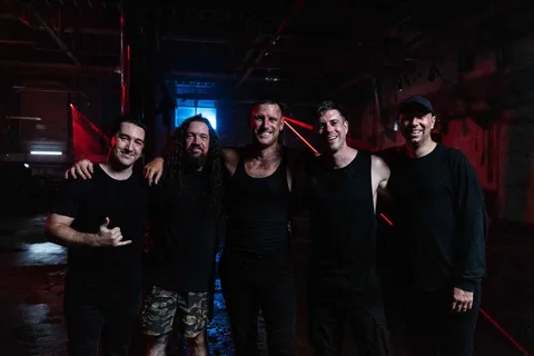 In Hearts Wake have released a new single, 'The Flood (ǝɔᴉʇsnɾ)', featuring Parkway Drive's Winston McCall